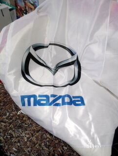 Mainoslippu Mazda